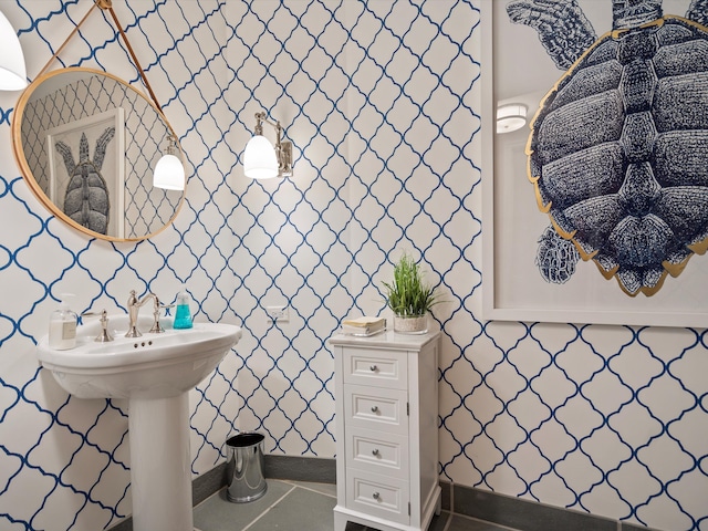 bathroom with tile patterned floors