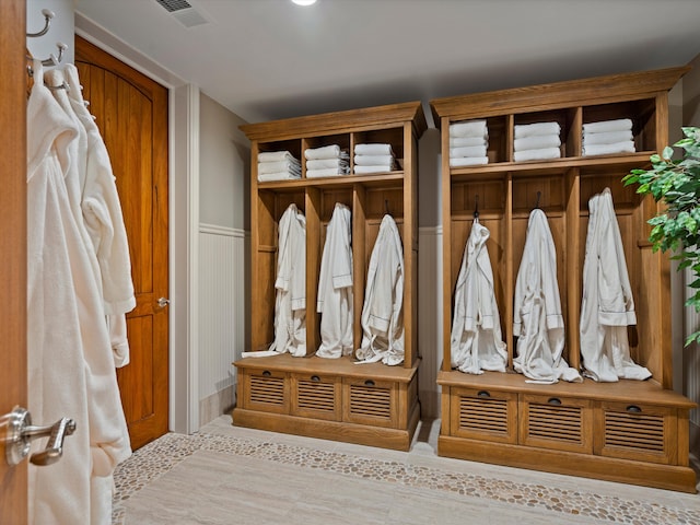 mudroom featuring a wainscoted wall and visible vents