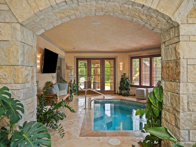 indoor pool with french doors