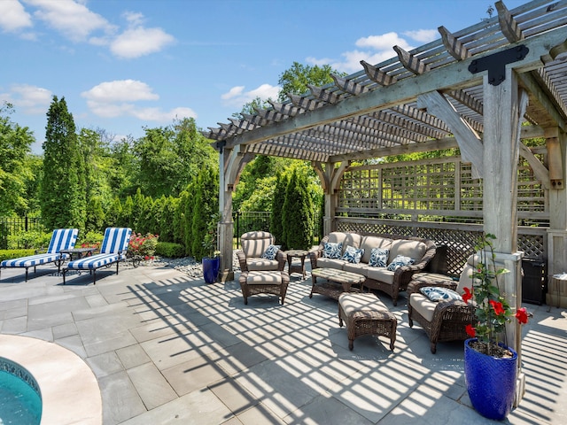 view of patio featuring outdoor lounge area, fence, and a pergola