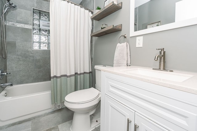 full bathroom featuring vanity, toilet, and shower / bath combo with shower curtain