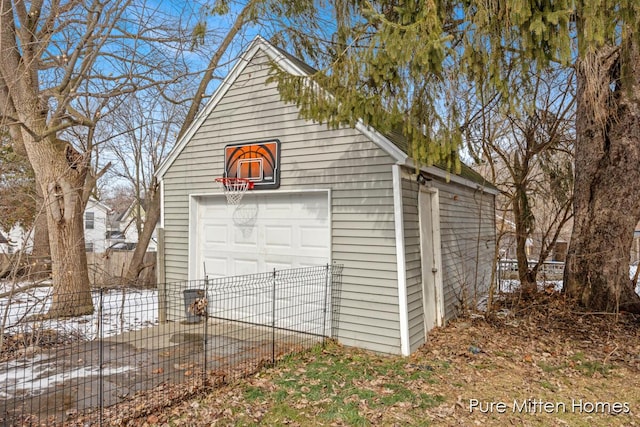 detached garage with fence