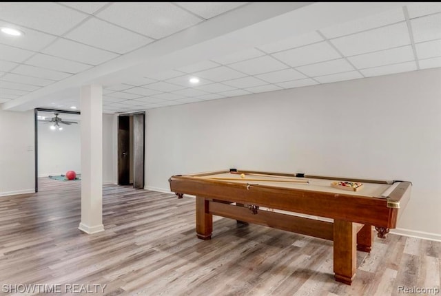 recreation room featuring a paneled ceiling, baseboards, billiards, and light wood finished floors