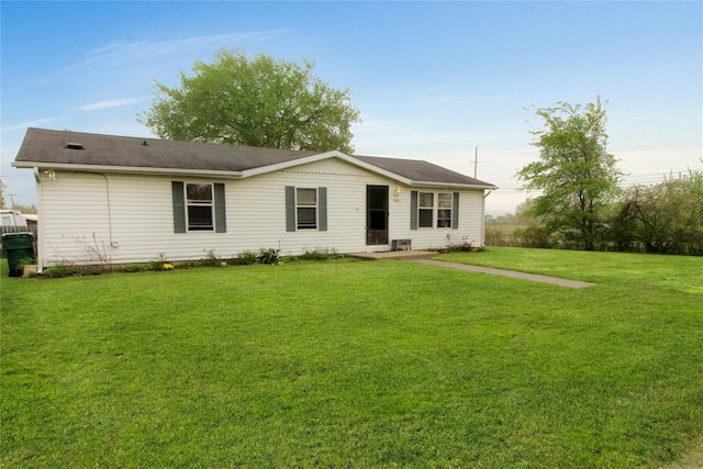 view of front of house with a front lawn