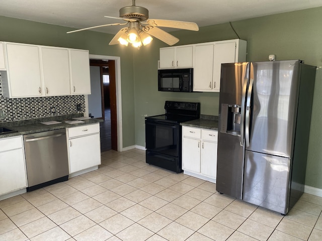 2609 Stanley Ave, Portage, MI 49002 - kitchen featuring black appliances, dark countertops, backsplash, white cabinetry, and a ceiling fan