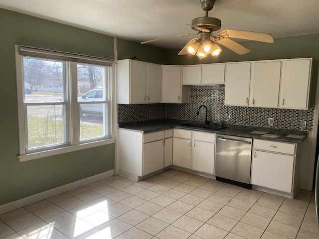 2609 Stanley Ave, Portage, MI 49002 - kitchen featuring tasteful backsplash, a wealth of natural light, dishwasher, and a sink