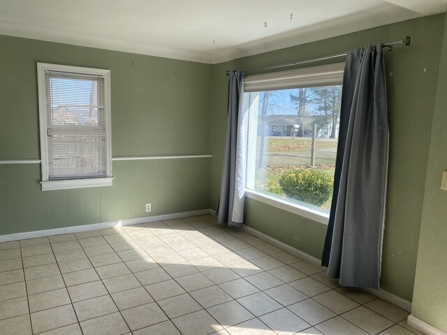 2609 Stanley Ave, Portage, MI 49002 - spare room featuring baseboards and light tile patterned floors