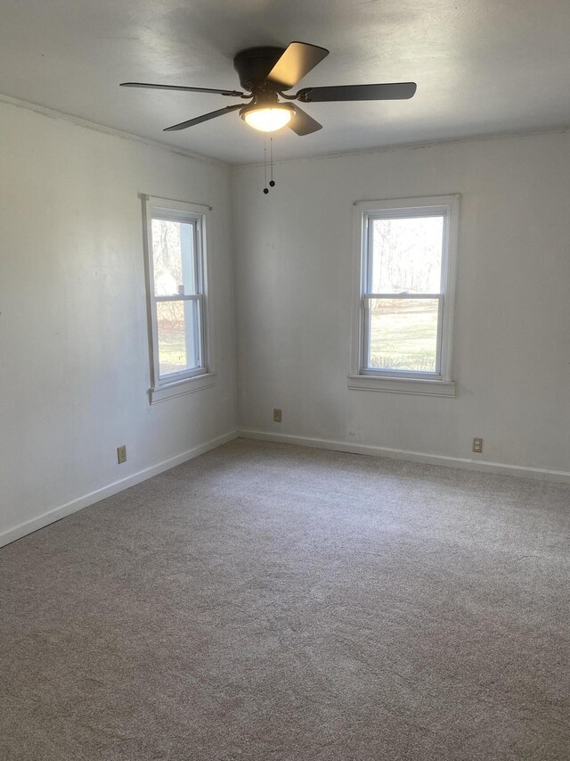 2609 Stanley Ave, Portage, MI 49002 - spare room with a ceiling fan, carpet, and baseboards