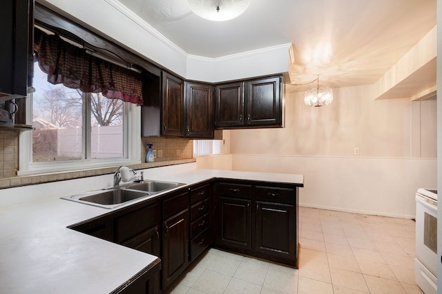 kitchen featuring tasteful backsplash, light countertops, white electric range, ornamental molding, and a sink