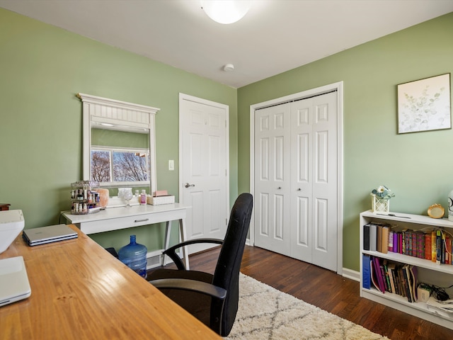 office area featuring baseboards and dark wood-style flooring