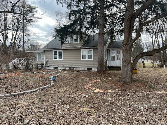 24067 Sargent Ave, Southfield, MI 48033 - rear view of property with a shingled roof
