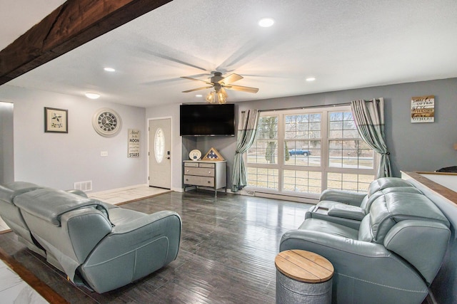 living room with baseboards, ceiling fan, wood finished floors, a textured ceiling, and recessed lighting