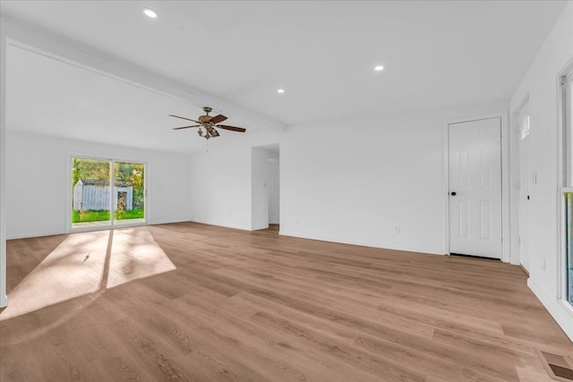 unfurnished living room with visible vents, light wood-style flooring, ceiling fan, beam ceiling, and recessed lighting