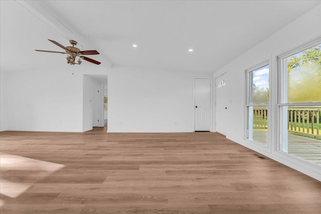 unfurnished room with lofted ceiling, ceiling fan, recessed lighting, visible vents, and light wood-style floors