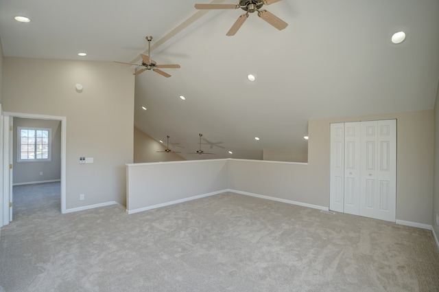 interior space with carpet, baseboards, beam ceiling, recessed lighting, and high vaulted ceiling