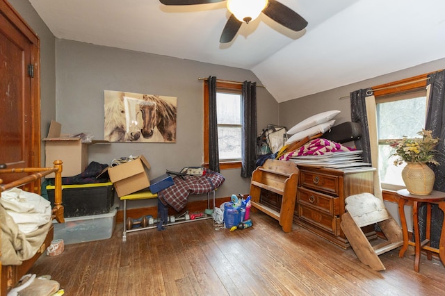 bedroom with lofted ceiling, ceiling fan, and hardwood / wood-style floors