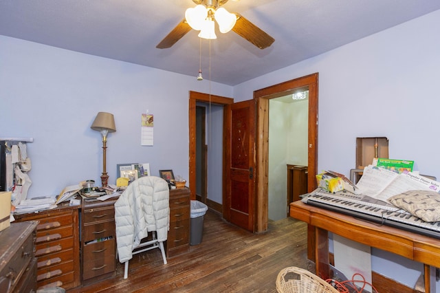 office featuring dark wood finished floors and ceiling fan