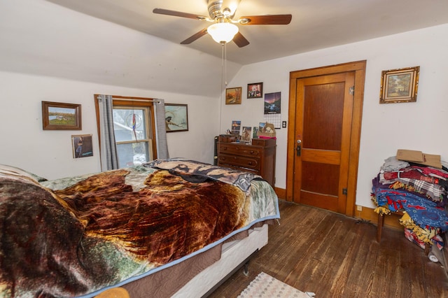 bedroom featuring lofted ceiling, ceiling fan, and wood finished floors