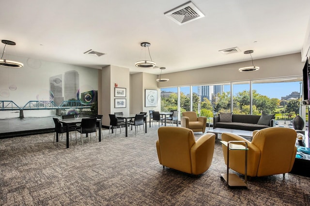 living room featuring carpet and visible vents