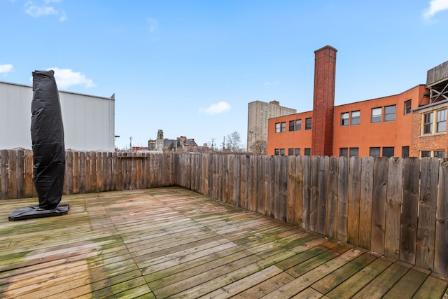 wooden deck featuring fence