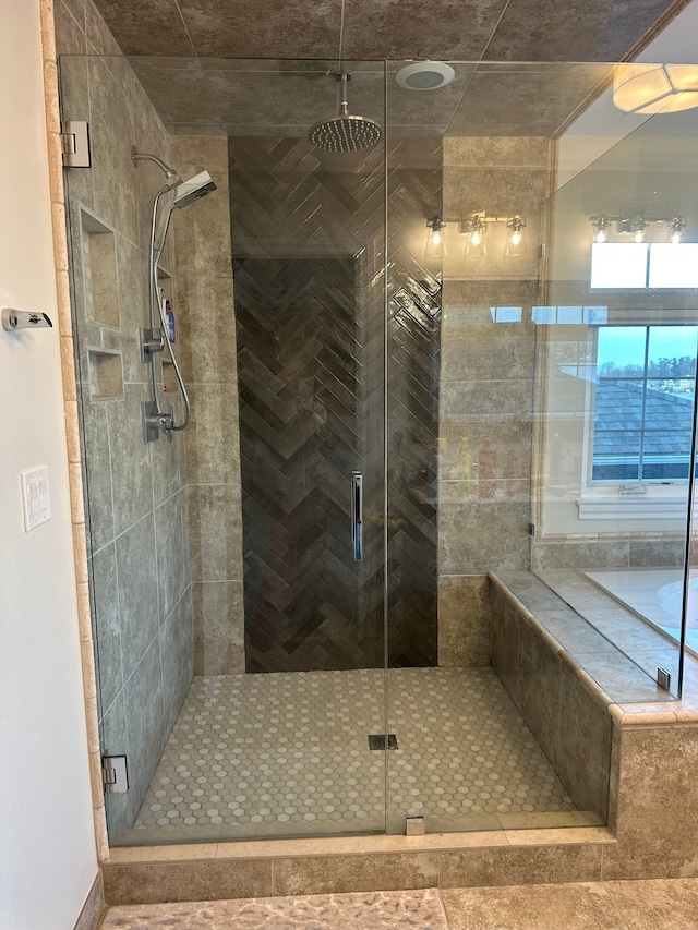 bathroom with a shower stall