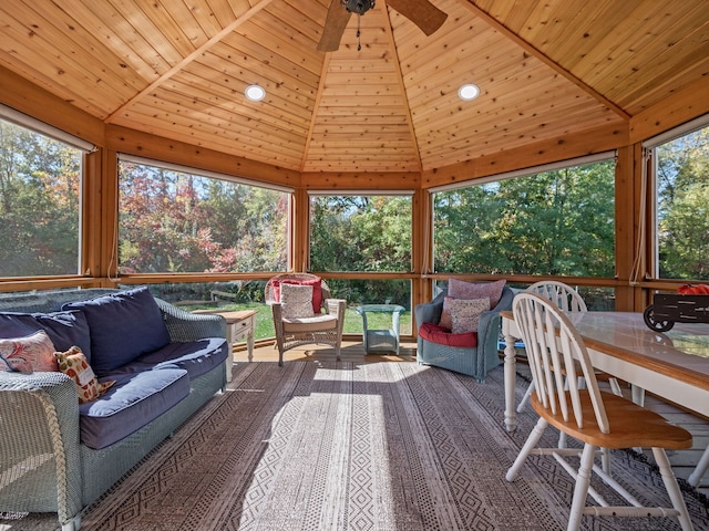 sunroom featuring a wealth of natural light, wooden ceiling, and vaulted ceiling