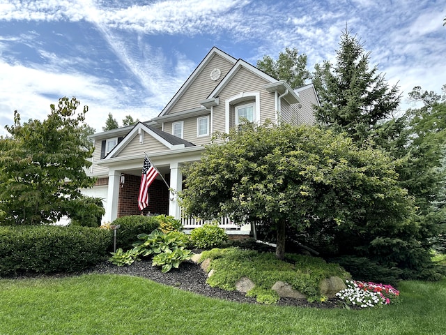 view of front of house with brick siding