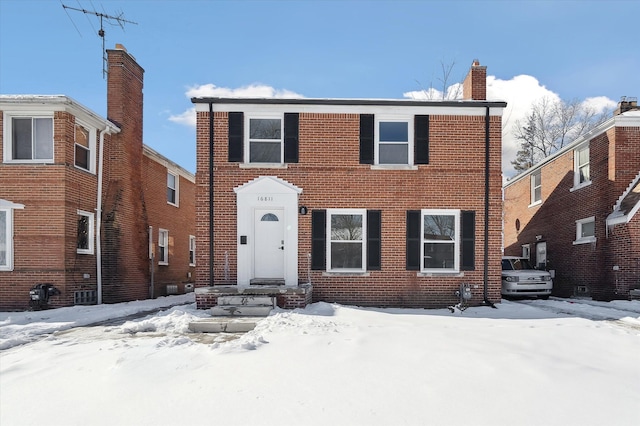 view of front of home with brick siding