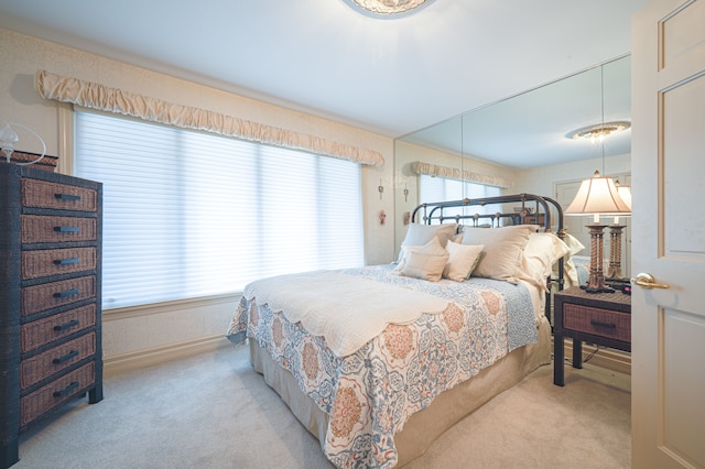 bedroom featuring carpet