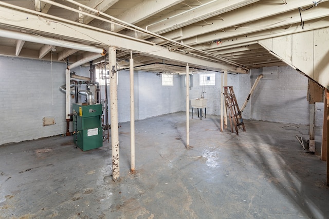 basement featuring a heating unit