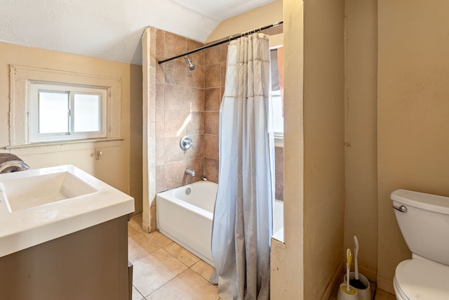 full bath featuring tile patterned floors, shower / bath combination with curtain, toilet, and vanity