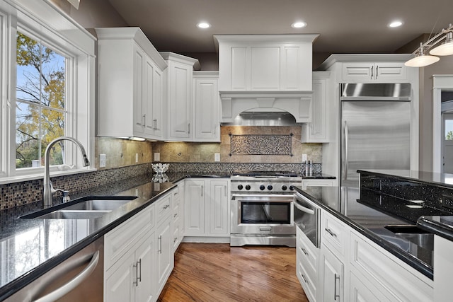 565 Golden Bear Ct, Saint Joseph, MI 49085 - kitchen with appliances with stainless steel finishes, white cabinets, a sink, and wood finished floors