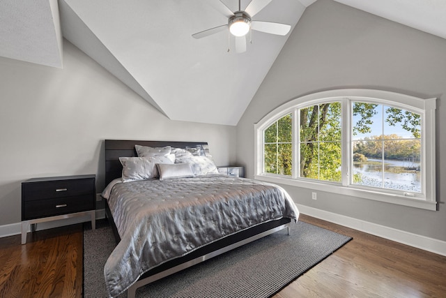 565 Golden Bear Ct, Saint Joseph, MI 49085 - bedroom with baseboards, vaulted ceiling, and wood finished floors