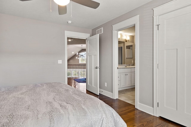 565 Golden Bear Ct, Saint Joseph, MI 49085 - bedroom featuring ensuite bathroom, dark wood-style flooring, a sink, visible vents, and a ceiling fan