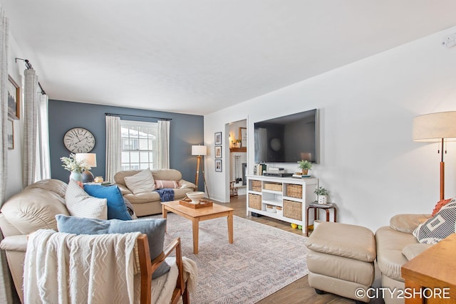 living area with wood finished floors