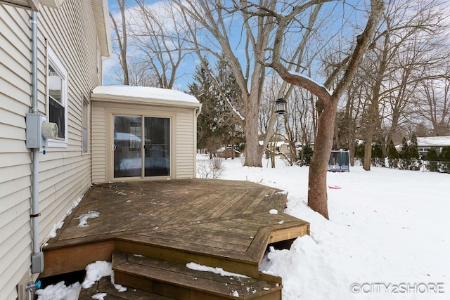 view of snow covered deck