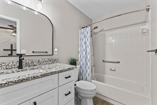 bathroom with wood finished floors, shower / bathtub combination with curtain, toilet, and vanity