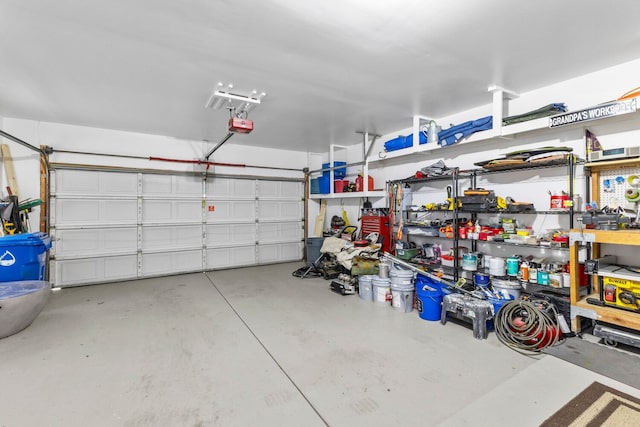 garage featuring a garage door opener