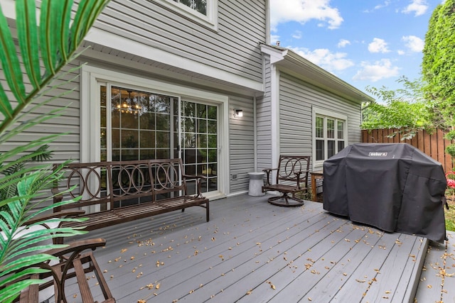 wooden deck featuring fence and grilling area