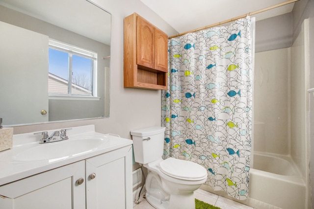 full bath with toilet, vanity, and shower / bath combo