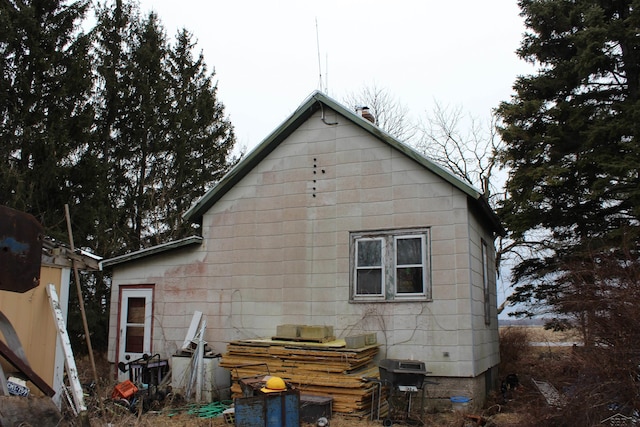 view of home's exterior with crawl space