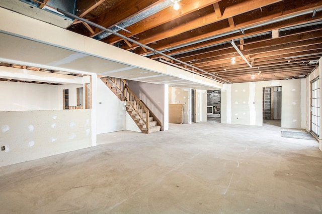 unfinished basement with stairway