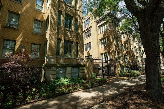 view of building exterior with cooling unit