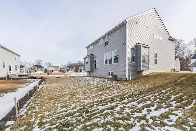 exterior space with a residential view and central AC unit