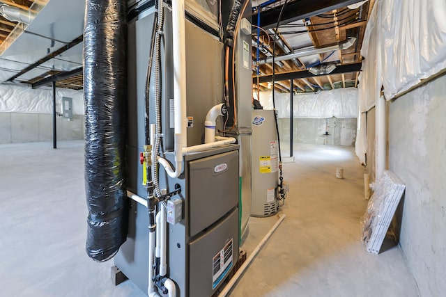 utility room with water heater