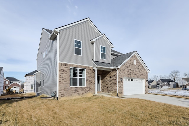 traditional-style home with a garage, brick siding, concrete driveway, a residential view, and a front lawn