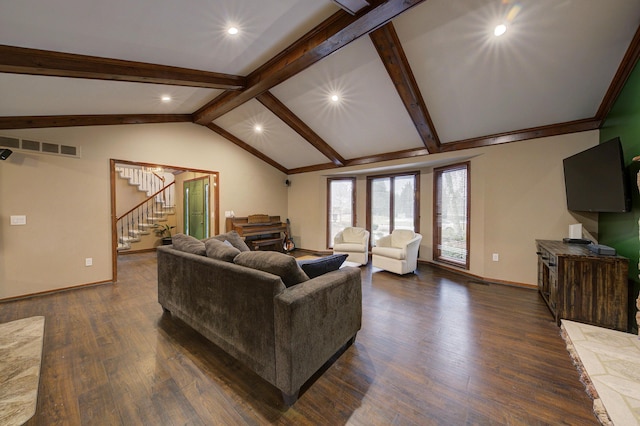 living area with wood finished floors, visible vents, vaulted ceiling with beams, and stairs