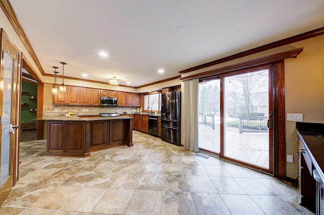 kitchen featuring black appliances, crown molding, decorative backsplash, and a sink