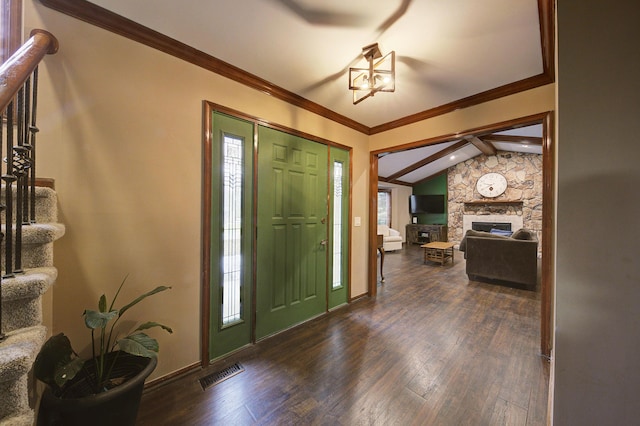 entrance foyer featuring vaulted ceiling with beams, dark wood-type flooring, stairway, and visible vents