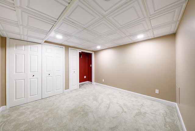 interior space with carpet floors, recessed lighting, a closet, and baseboards